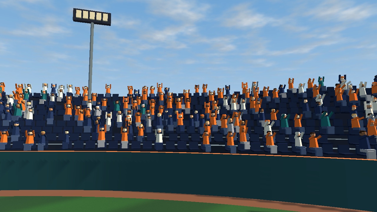 A stand full of fans in orange and navy jumping with their arms raised.